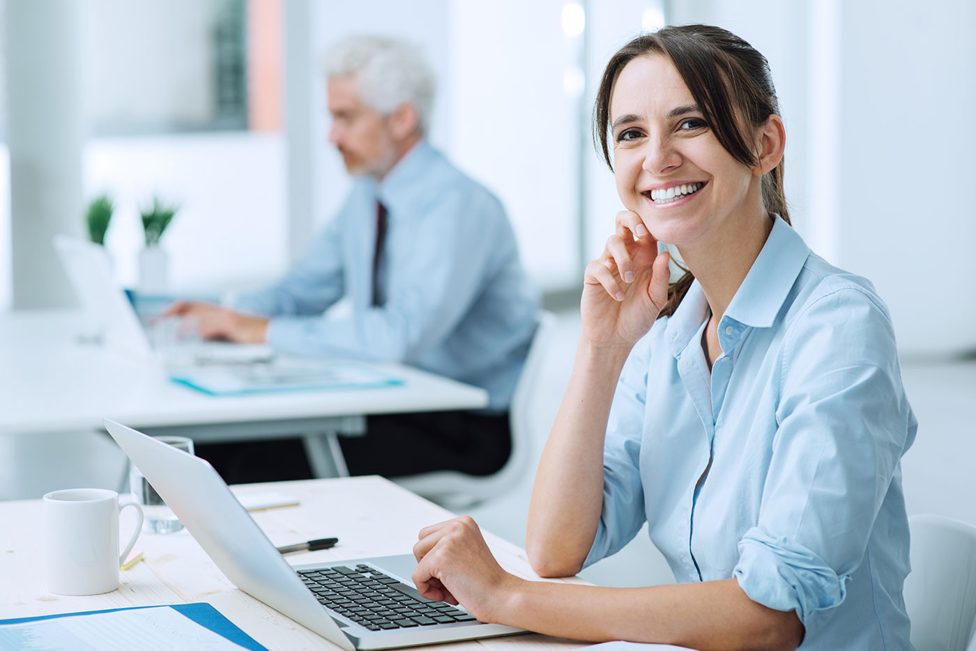 Smiling business woman at work